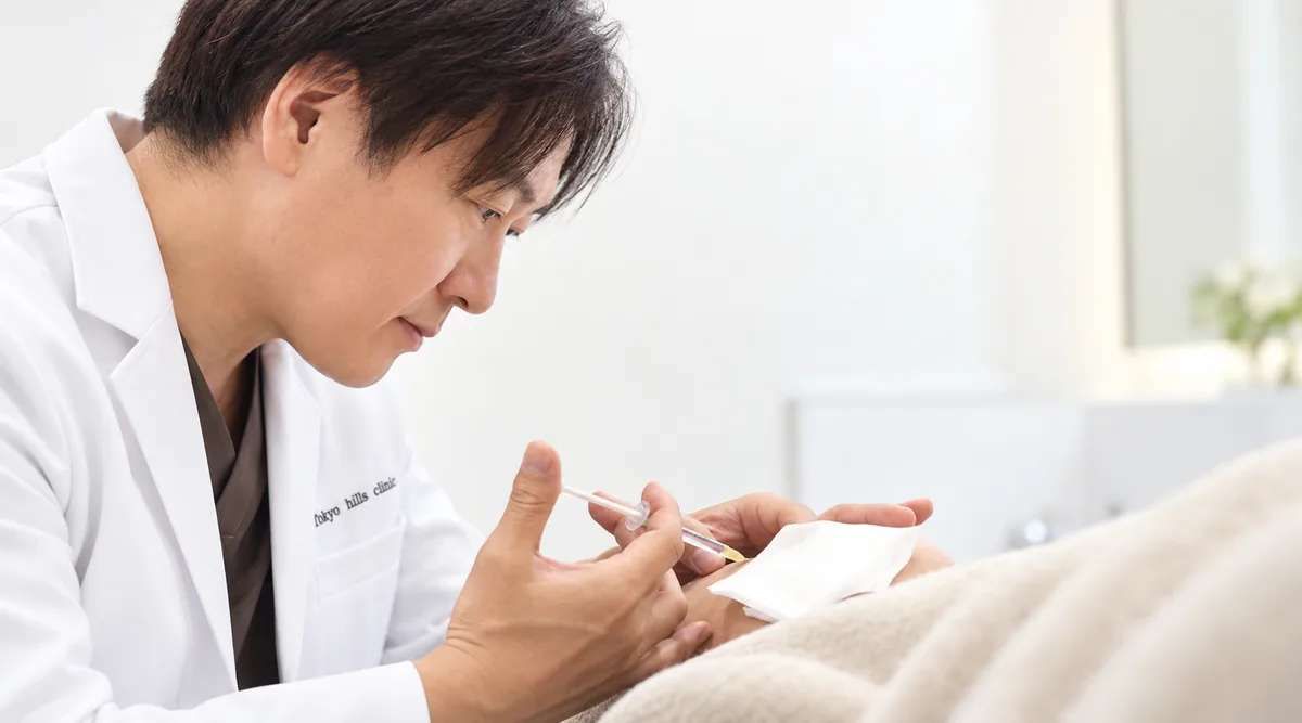 藤井一久医師 施術中のカット